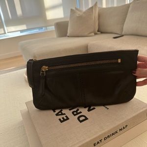 Black leather roots clutch